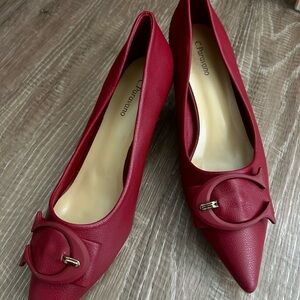 C. Paravano Buckle Pumps